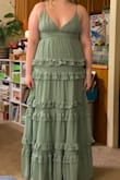 I loved this dress! I ordered six dresses for prom and fell in love with this one, but it was just too tight to be comfortable at all or move in. The straps were also quite uncomfortable, holding up the weight of my chest. With the shape of the cups not being able to wear a bra or a sticky bra without it showing the support was left to the straps. I was super sad when I couldn't order another size up, so I settled for one of the other dresses I ordered. - Morgan B.