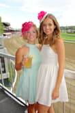 I got this dress to wear for a horse race and it was perfect for the occasion! It runs a little small but ended up working perfectly! The material is a little heavy but gives the dress great shape. - Leah S.