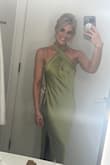I wore this to a bachelorette trip in Miami. It does run large and I should've gotten the xxs but it was sold out so I did opt to have it tailored. There was waaaaaay too much side boob otherwise. But simple, elegant, and the best color! - Lindsay G.