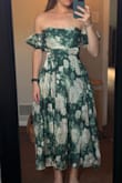 The top fits great and is adjustable with the straps in the back. It is difficult to tie the back by myself, but not impossible. Love the style and the material is good. I'm not afraid of it falling down. The arm things are a little funk,y but I think I like them. Can't wait to wear it for a wedding! - McKenzie G.