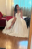 The dress is gorgeous! It's sleek, the bead work is pretty, I definitely made the right choice for my wedding dress and I also got my heels from Lulus as well, great match! - Amanda C.