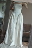 I chose this as my wedding dress! Will be altering the bodice to fit tighter. The length is only about 2 inches too long, so I will not need to alter it with heels. - Jessica K.