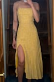 The dress is beautiful and it fits perfectly! - Marcela M.