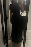 This dress is INCREDIBLY LONG, even with 5+ inch heels. Make sure to leave time to get it tailored shorter before ordering. The zipper is also very janky and gets stuck. I got two different sizes, and the zippers on each were both cheap and got stuck every time. But the dress itself is flattering and comfortable. The fabric is nice and not itchy. I ordered a medium and a small, I ended up choosing the small. I'm 5'6" and 125-130lbs. I returned the medium, and the return was processed very quickly. - Avery K.