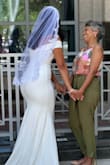 I fell in love with this dress the moment I put it on. A week prior to my wedding day. It fits like a glove, true to size, I am curvy on my bottom, and the material felt great. I did not wear a bra because I am tiny at the top. The dress is not see through, so it worked out perfectly. - Jaleni N.