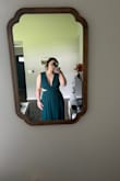 Ordered for a work event, and it was beautiful, just incredibly scant in the front compared to what I was expecting. One of the 2 sizes I tried had some closure issues where the hook was literally hanging by a thread, but the other one was fine. - Amelia B.