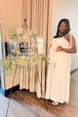 Bought this for my small wedding while 30 weeks pregnant, and the fit was great. I did have to make some small adjustments to remove some fabric at the bottom, but overall, not too bad. - Deddie S.