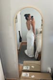 I typically wear mediums, but I ended up ordering a small and then an extra small to avoid any need for alterations. I'm 5'8'' and wouldn't want the dress to be any shorter, though. The straps are still a tad too big for me, but easy to get those taken in, and I am planning to add a bustle. Back is amazing. It has a good weight to it. The beading goes all the way to the edge of the dress. I noticed it while putting it on, but I don't think it will bother me enough to not wear it for the night. So excited to wear it and show my fiance!! - Steph K.