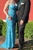 This dress runs true to the size chart. Normally a medium but bought this in a large. The strap broke during prom but was able to tie it up. low cut and a good bit flows on the ground. Beautiful color. - Jennifer D.