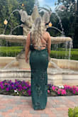 Absolutely loved this dress! I'm 5'8 and I still needed to wear tall heels. It was still touching the ground, but that's part of the appeal of this dress. Got lotsss of compliments on it. The only thing that sucked was one of the tags was on the seam down the side of my leg and it tore the dress when I tore it off, but fashion tape fixed it. Highly recommend! - Madison V.