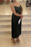 Fits true to size. I did have issues with the zipper getting stuck but that was it. Otherwise I loved the dress. - Samantha P.
