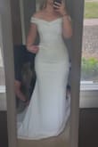 I went with a medium and it fit perfect. I was nervous because I have a small busy and waste but wide hips. The material stretched well over my hips and butt. The quality is amazing! - Chloe D.