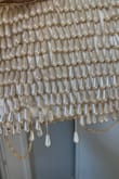 I love this purse and it's absolutely beautiful. I bought it as my wedding purse and to bring on my honeymoon. Unfortunately it was falling apart before the wedding even started. Would not recommend for the cost. - Cecilia D.