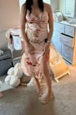 This dress was soft, elegant, and pretty! However, it wasn't very forgiving for my postpartum figure. I love the slit and material, but it showed my tummy too much so I decided to return. I'd love to try it again when my belly is smaller! - Shelby C.