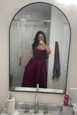 It fits great and the material is very nice. Not cheap at all. I usually run a size small in top and medium in bottom but opted for a small and it fit perfectly! Would deff buy again if they had it in black ! So cute - Rachel E.