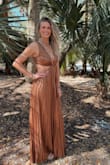 I have never received so many compliments in my life! Our friends got married in Charleston so I wanted something beachy but sexy. I ended up pairing the dress with gold & turquoise jewelry, absolutely perfect. The bust was a little loose but besides that I have no complaints. Danced my life away and felt hot which is a big deal as a mom of two under two! - Jordan F.
