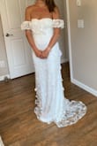 My measurements measured on their size chart as: XS bust-XS waist-Medium hips&.I ordered this dress in a small and it fit absolutely perfectly and no alternations are needed. My first impression was the material and quality of the dress overall was so much better than expected for an under $200 wedding dress. It is very flattering and comfortable. I tried on 3 Lulus dresses and chose this one for my June elopement. - Jenna S.