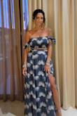 I'm in love with this two piece maxi.  The skirt fit true to size and was not too long on me with a heel - I actually did not have to hem this skirt.  The top is stretchy and so it fit nicely with plenty of room but not so loose that I felt like I had to keep pulling it up.  I felt comfortable to dance in it with no issues.  I will say that the zipper is not the best and did break on me after I wore it - I was able to get out of the skirt but not zip it back up afterwards.  I had to have it replaced with the tailor. - Rachelle A.