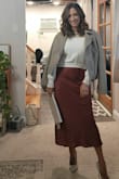 Great skirt to dress up with a heel or boot or dress down with a sneaker. The skirt fits true to size, with a side zipper and a slight stretch it is very comfortable. I'm 5'1" and so I thought the skirt would hit on me slightly lower than the model but it came about mid calf and looked great with my heels. - Rachelle A.