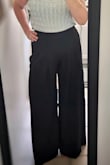 I found the pants do not run big. I have long legs for my height and they almost touch the floor with no shoes on which is the perfect length for wide leg pants to elongate the silhouette IMO. They obviously don't work as well for shorter folks based on other reviews but I love them. - Nichole U.