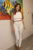 Great top - fits perfect - not too short!  I love it so much after I bought the white that I got again in the rust color.  I will say that if you are top heavy I would size up as you can tie the back as tight or as loose as you need it on the bottom of the shirt but the top might fit too tight it you have a larger chest. - Rachelle A.