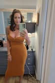 I bought this dress to wear on vacation in Florida in October and it was perfect.  The dress is heavier being that it is a sweater dress so not sure it would have been a good dress to wear in the summer months of Florida but worked perfect in October.  The dress fits true to size considering it does not have a zipper.  It did not stretch out on me throughout the night and stayed in place.  I felt very comfortable in it all night long. - Rachelle A.