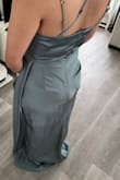 I think the front of the dress is gorgeous, and this color is very elegant. My biggest issue was with the back, please see the attached picture. I think it may be the dress I was sent, the zipper pokes up near my butt and looks very odd. Not very flattering, I sent it to get tailored. I didn't have time to return since the family wedding was soon, and we were required to wear this color. 
Even the tailor was a bit shocked at how poorly made the back was. Just to keep in mind, since that's an additional cost - Emily A.