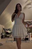 As someone who wears a small band, large cup, I have a real hard time finding good dresses. This one was absolutely perfect. The material is super light and comfortable; it stretches a ton so was very great on my chest. White is often see-through but because of the double lining, it's not at all. The length is great too, not too long, not too short (although my height may have something to do with that). Even though I bought it for graduation, I will be wearing this dress for any occasion. Loved it! - Jolie K.