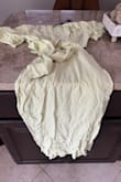 The whole dress is extremely wrinkled.. very upset - Gina M.