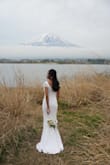 I bought this for my prewedding photo shoot and was worried about whether it would fit. When it arrived, it fit my body perfectly. I was very satisfied. It was very comfortable to wear during the photo shoot day. This is a perfect dress! - WIN M.