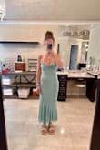 This dress is so fun! It has unique ruching on the sides, and a playful trumpet flare at the bottom. It's super stretchy and has adjustable straps, which is nice. Unfortunately, I have more of an athletic build, and I think this dress would look better on someone with curves. I wanted it to work because it's so comfortable, but it just made me look flat everywhere. - Elizabeth