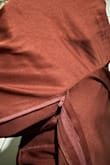 The pants looks great on the body, BUT it does feel like cheap polyester material. I still like it and think it looks cute - Kimmie W.