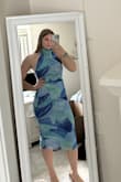Dress was stretchy, very comfortable, and flattering on any body type, but the colors were very dull--not as bright as shown on the model. Looks like it was washed with dark clothing - Addie S.