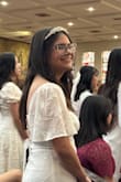 I bought this dress for my daughter's confirmation at church. Very pretty. She is only 5 feet tall, so she wore 3 inch heels to accommodate the length of the dress. We got those adhesive bra cups because of the lace up back. And because the front is just a little see through. She received a lot of compliments. - Nicole A.