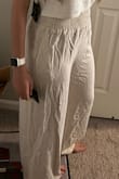 These pants are perfect for the beach! I love how long they are; they're high wasted and reach my feet. I might have to hem them a little to get the best length, but I really do love them.
Side note: the waistband is really thick, which makes them unflattering with certain tops. They will also need a quick wash because they are wrinkled and itchy. However, I'm still keeping them. - Regina R.