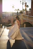 Dress is absolutely gorgeous. Walked around Vegas with it and got so many compliments. - Kinah S.