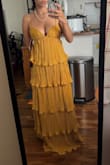 at first, I got a size small and it did not fit well in the bust. The sides like by my armpit were loose, and it wasn't holding my girls in very well. But the size xs was way better. I think it might be a little too much in the chest for some, it was almost showing too much for me, but I'm just gonna roll with it. One thing though, is that it is definitely too long. I'm 5'3 and half of the bottom tier drags even with heels, so I'm just going to cut it off so it fits right. It fits great, very loose and comfortable, but still snug in the bust, so I don't have to worry about a potential slip. - Jenni L.