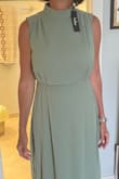 Ended up returning it because my daughter wanted a different style for her wedding. However, the dress was well made, beautiful and true to size! - Anivet M.