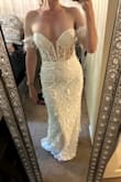 This dress looked so beautiful, I just bought it after thinking about it for a few days and not forgetting about it! Perhaps I can save it for a vacation, bridal event, if I ever get engaged, etc, but maybe just wear for fun! Well made, a little scratchy in some areas but doesn't detract from its worth - Amber L.