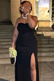 True black dress. No adjustments needed for length at 5'5 and zipper was sturdy. Be aware the boning in the top is plastic in the body of the corset style dress. Thick enough not to show cellulite. - Elyssa G.