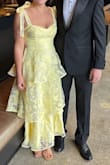 Loved this dress! It has no give - so order your size or potentially size up in you need some room. Straps are adjustable. I received so many compliments!  Zipper is tough so make sure you'll have help when putting it on! - Mayghen S.