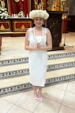 This dress ended up being perfect. It was purchased for my 15-year-old daughter's confirmation ceremony. I did sew closed about 3" of the slit, because it was a little high for the occasion. She wore a small cardigan to cover her shoulders for the ceremony, but it was such a lovely dress. - Amanda O.
