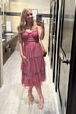 I wore this dress to a rehearsal dinner for a wedding I was in, and I got so many compliments! It's so cute and comfy! The straps are adjustable, and the length is perfect. The ruffles are flowy enough that I think it would be super fun to dance in! I'm obsessed! - Faith M.
