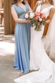 I bought this dress for my sister for my wedding! She was the maid of honor, and it was perfect! The deep V neckline is likely a little better for someone with a bigger bust, but it was SO cute! - Faith M.