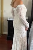 This indeed is the perfect 2nd wedding dress for anyone in their 30, 40's 50's and yes even in their 60's.  The off the shoulder style with sleeves that perfectly cover up "not so perfect" arms is just what I need to make me look and feel beautiful on my wedding day.   The white lace over nude lining is brilliant! - Liz A.