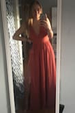 I ordered this for prom and I absolutely love it!! It's a little long even with heels but I will be getting it hemmed. - Emma M.