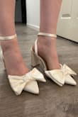 I absolutely love the way these looked! I bought them for my wedding, but unfortunately, they don't work with my dress. However, I still plan to keep them. They are a tiny bit tighter than expected, but not a big deal. - Raichel W.