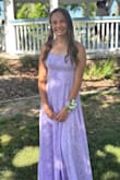 I have purchased from lulu before and I have always fit the x-small.  This was no different.  The back straps adjust and with cakes, the girls stayed in place.  I love the lavender color, the floral pattern, the way the dress ruffled.  It was the perfect amount of pretty, modest and glamorous. - Greta P.