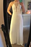 I usually would have ordered a small, but from reading other reviews I ordered an xsmall and it fit perfect. Looking forward to wearing it to my rehearsal dinner. - Paige K.