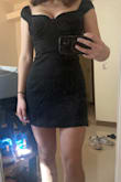 Cute and fun little black dress. The waist to chest proportions were slightly off, but still super cute. - Emily C.